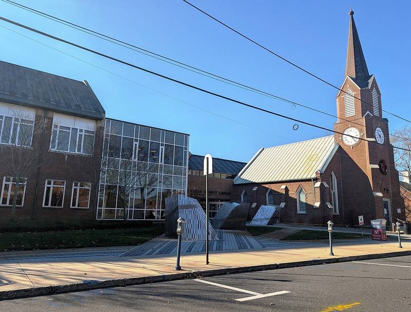 The Ocean County Library headquarters on Washington Street, beside a brick church