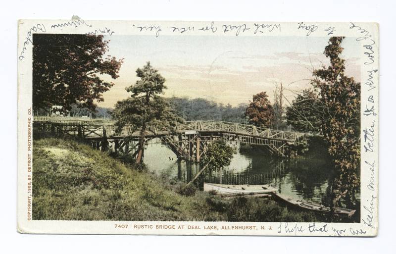 Vintage postcard of a rustic wooden footbridge over Deal Lake in Allenhurst