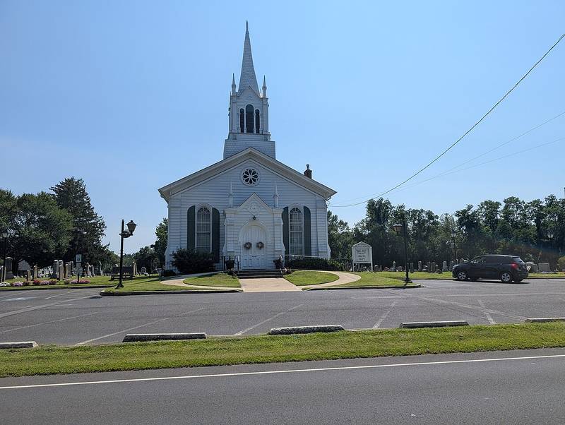 The white steepled Ardena Baptist Church and its cemetery on Route 524